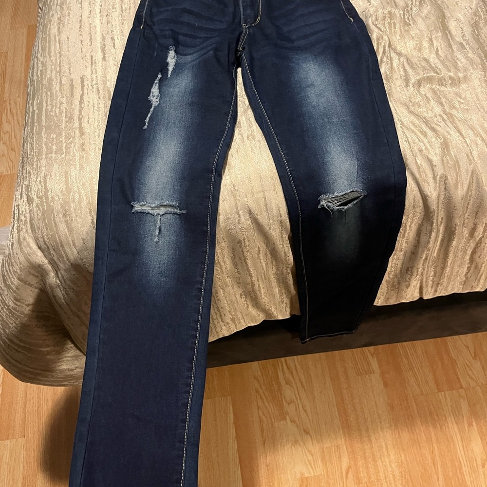 Distressed Dark Blue Jeans
